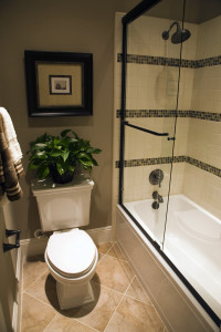 Designer bathroom with a modern tub and tile floor.